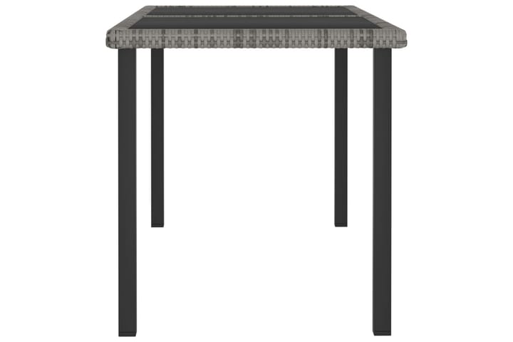 Puutarhan ruokapöytä harmaa 140x70x73 cm polyrottinki - Ruokapöytä terassille