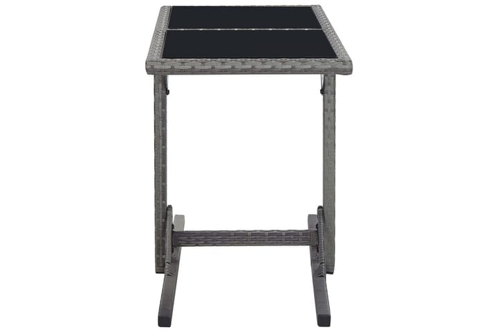Puutarhapöytä musta 110x53x72 cm lasi ja polyrottinki - Ruokapöytä terassille