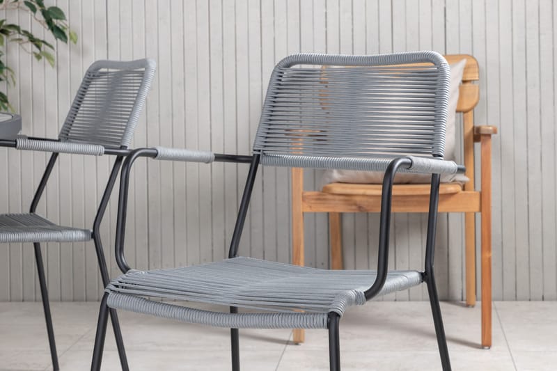 Ruokailuryhmä Parma Pyöreä 140 cm 6 Lindos tuolia - Musta/Harmaa - Puutarhakalusteet - Ulkoryhmä - Ruokailuryhmät ulos
