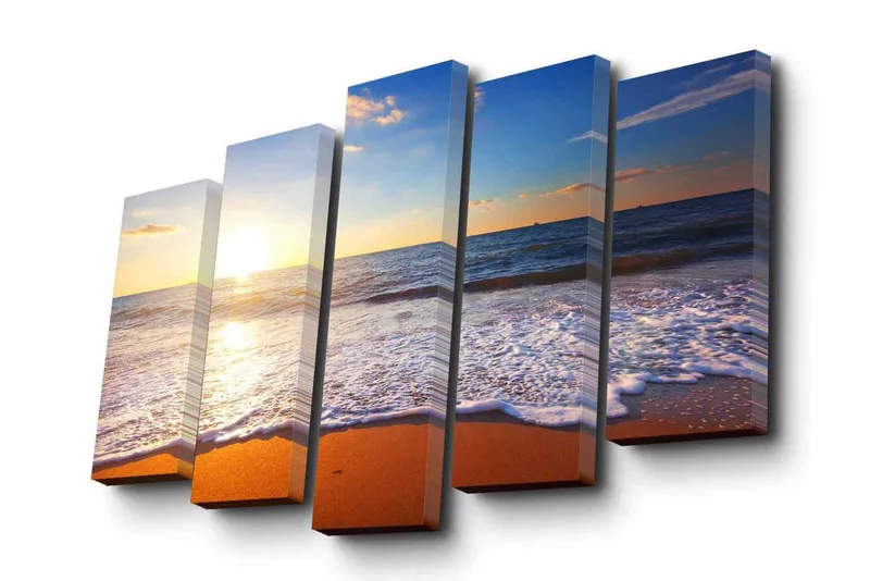 5-osainen canvas-taulu 82x50 cm - Auringonlasku meren yllä pehmeiden aaltojen vyöryessä kohti rantaa, Sininen / Oranssi / Valkoinen