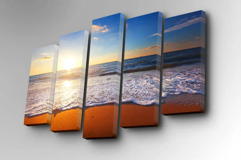 5-osainen canvas-taulu 82x50 cm - Auringonlasku meren yllä pehmeiden aaltojen vyöryessä kohti rantaa - Sininen / Oranssi / Valkoinen - Sisustustuotteet - Taulu & taide - Canvas-taulu