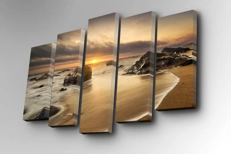 5-osainen canvas-taulu 82x50 cm - Auringonlasku rannalla kivien ja lempeiden aaltojen keskellä - Kulta / Harmaa / Beige - Sisustustuotteet - Taulu & taide - Canvas-taulu