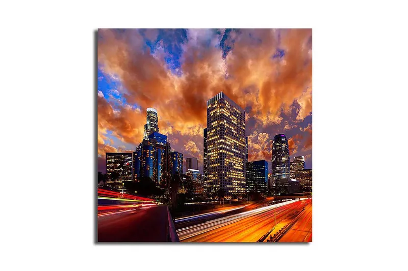 Canvas-taulu 45x45 cm - Kaupungin siluetti dramaattisen auringonlaskun aikaan, Oranssi / Sininen / Harmaa