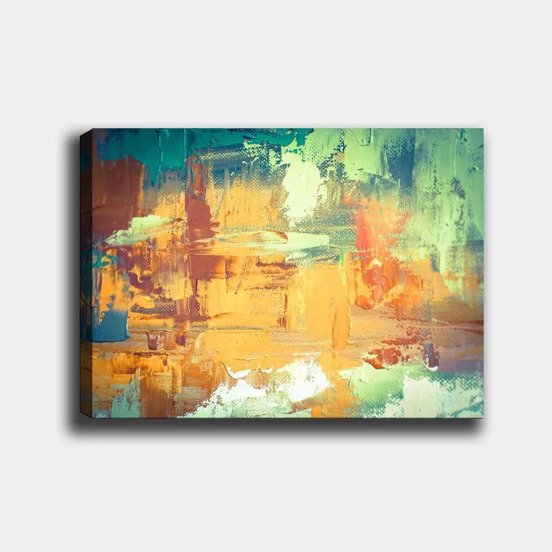 Canvas taulu 70x100 cm - Abstrakti maisema lämpimillä ja kylmillä väreillä, jotka luovat dynaamisen sommitelman, Vihreä / Oranssi / Sininen