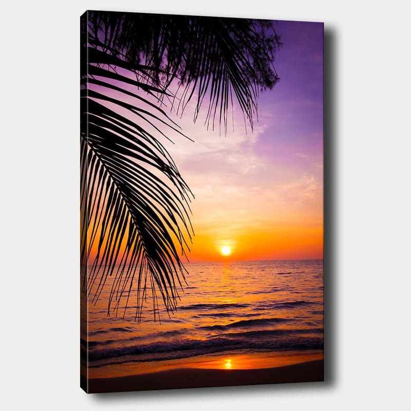 Canvas taulu 70x100 cm - Auringonlasku meren yllä, palmuja etualalla, Violetti / Oranssi / Keltainen