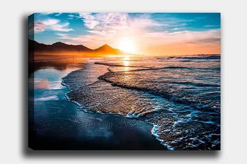 Canvas taulu 70x100 cm - Auringonlasku rannalla lempeiden aaltojen vyöryessä kohti rannikkoa - Sininen / Oranssi / Turkoosi - Sisustustuotteet - Taulu & taide - Canvas-taulu