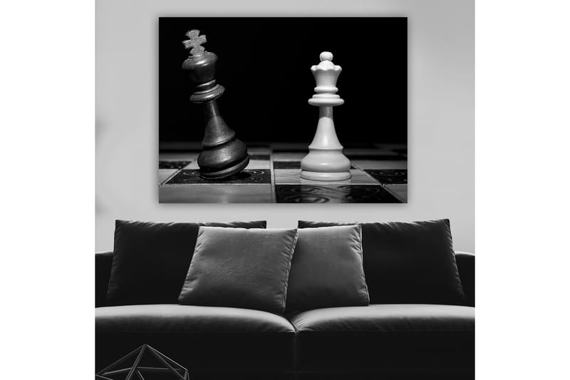 Canvas taulu 70x100 cm - Dramaattinen kuvaus kahdesta shakkikuninkaasta, toisesta mustasta ja toisesta valkoisesta, intensiivisessä yhteenotossa - Musta / Valkoinen - Sisustustuotteet - Taulu & taide - Canvas-taulu