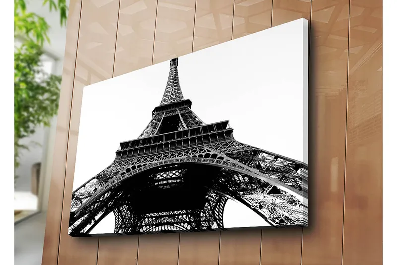 Canvas taulu 70x100 cm - Dramaattinen näkymä Eiffel-tornista alhaalta katsottuna - Musta / Valkoinen - Sisustustuotteet - Taulu & taide - Canvas-taulu