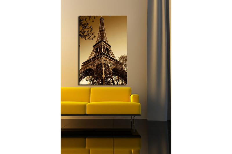 Canvas taulu 70x100 cm - Eiffel-torni dramaattisessa kulmassa, joka korostaa sen vaikuttavaa rakennetta - Kulta / Ruskea - Sisustustuotteet - Taulu & taide - Canvas-taulu