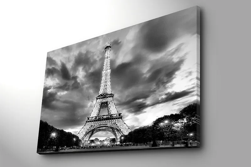 Canvas taulu 70x100 cm - Eiffel-torni dramaattisessa mustavalkoisessa sommitelmassa - Musta / Valkoinen / Harmaa - Sisustustuotteet - Taulu & taide - Canvas-taulu