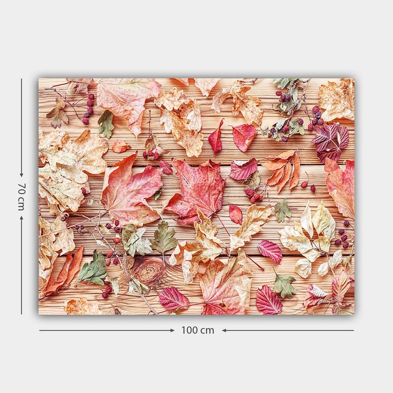 Canvas taulu 70x100 cm - Eriväristen syksynlehtien kokoelma puupinnalla - Punainen / Keltainen / Vihreä - Sisustustuotteet - Taulu & taide - Canvas-taulu