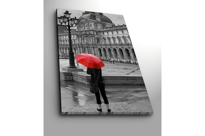 Canvas taulu 70x100 cm - Henkilö seisoo punaisen sateenvarjon kanssa sateisessa kaupunkiympäristössä historiallisen rakennuksen edessä - Punainen / Musta - Sisustustuotteet - Taulu & taide - Canvas-taulu