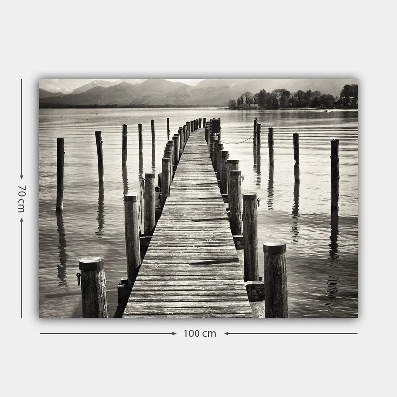 Canvas taulu 70x100 cm - Hiljainen laituri veden yllä, pintaan heijastuvien pilarien ympäröimänä - Musta / Valkoinen / Harmaa - Sisustustuotteet - Taulu & taide - Canvas-taulu