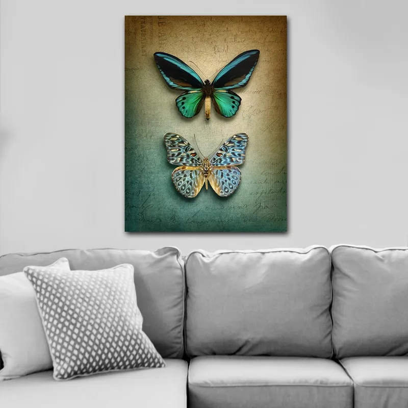 Canvas taulu 70x100 cm - Kaksi kaunista perhosta harmonisessa sommitelmassa, Turkoosi / Vihreä / Sininen