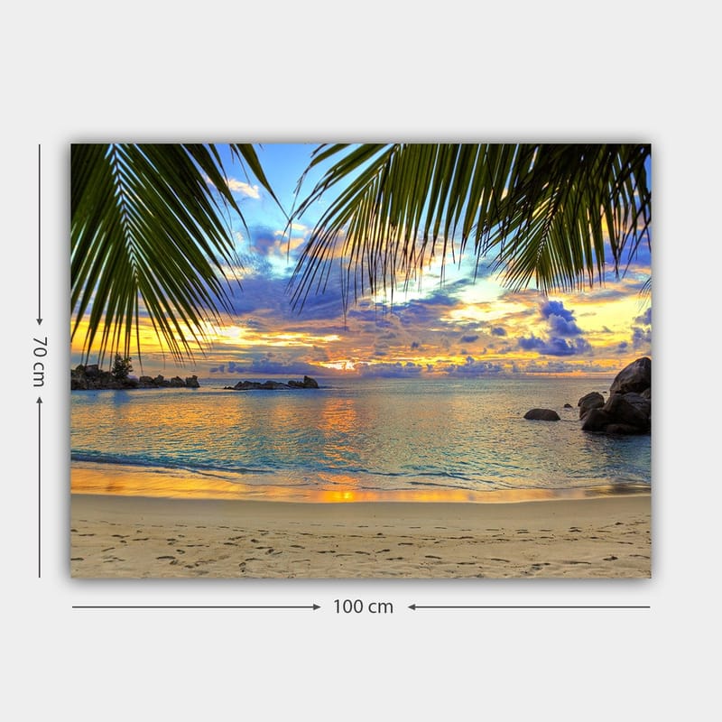 Canvas taulu 70x100 cm - Kaunis auringonlasku rannalla, palmujen reunustamana aiheen yllä - Sininen / Oranssi / Vihreä - Sisustustuotteet - Taulu & taide - Canvas-taulu