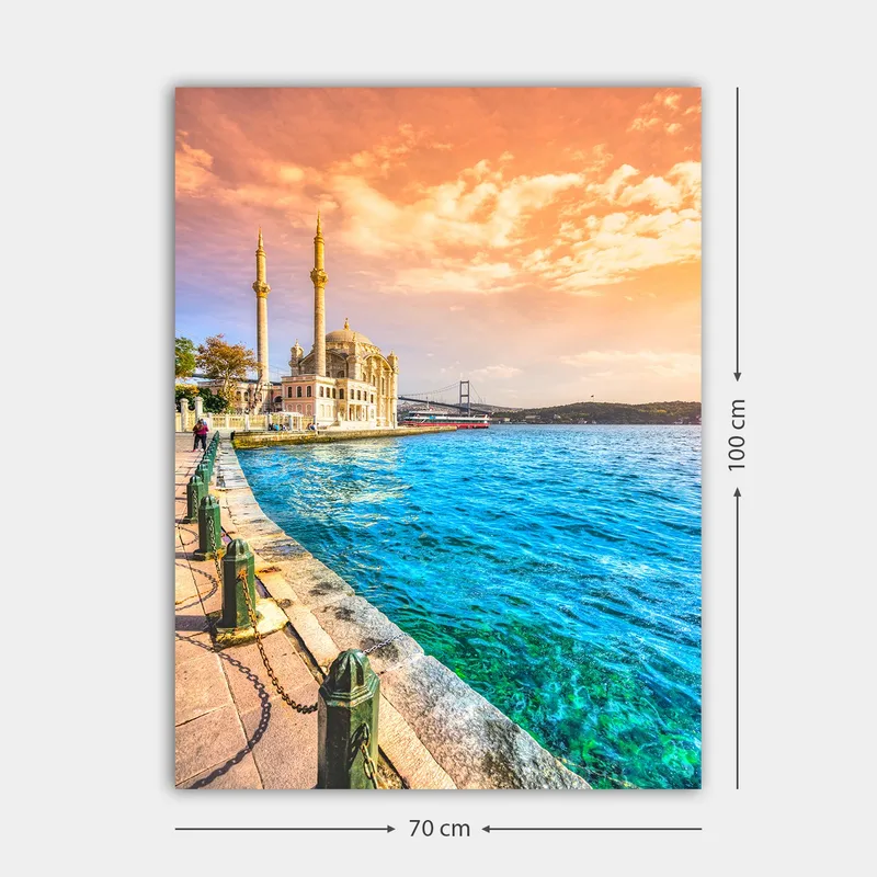 Canvas taulu 70x100 cm - Kaunis näkymä moskeijasta veden äärellä, taustalla silta värikkään taivaan alla - Sininen / Oranssi / Beige - Sisustustuotteet - Taulu & taide - Canvas-taulu