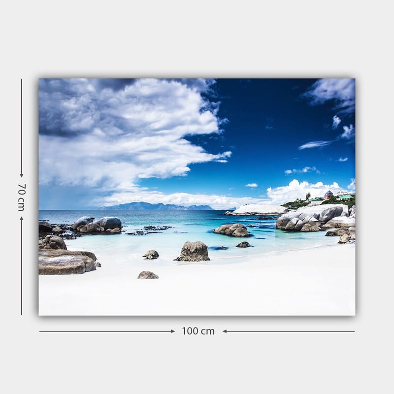 Canvas taulu 70x100 cm - Kaunis rannikkomaisema kallioilla ja kirkkaan sinisellä vedellä dramaattisen taivaan alla - Sininen / Valkoinen / Harmaa - Sisustustuotteet - Taulu & taide - Canvas-taulu