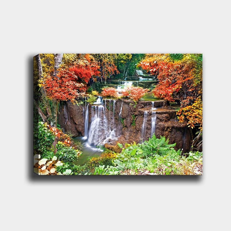 Canvas taulu 70x100 cm - Kaunis vesiputousmaisema värikkäiden syksyn lehtien ympäröimänä, Punainen / Vihreä / Ruskea
