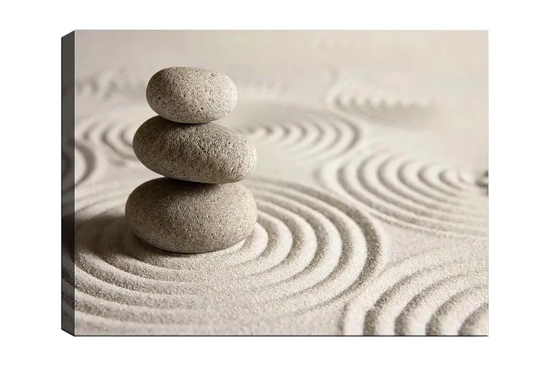 Canvas taulu 70x100 cm - Kolme pinottua kiveä hiekkaisella pinnalla aaltoilevilla kuvioilla, Harmaa / Beige
