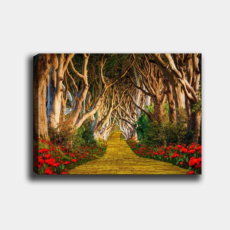 Canvas taulu 70x100 cm - Kukkien reunustama maaginen polku puiden muodostaman tunnelin läpi, Keltainen / Vihreä / Punainen