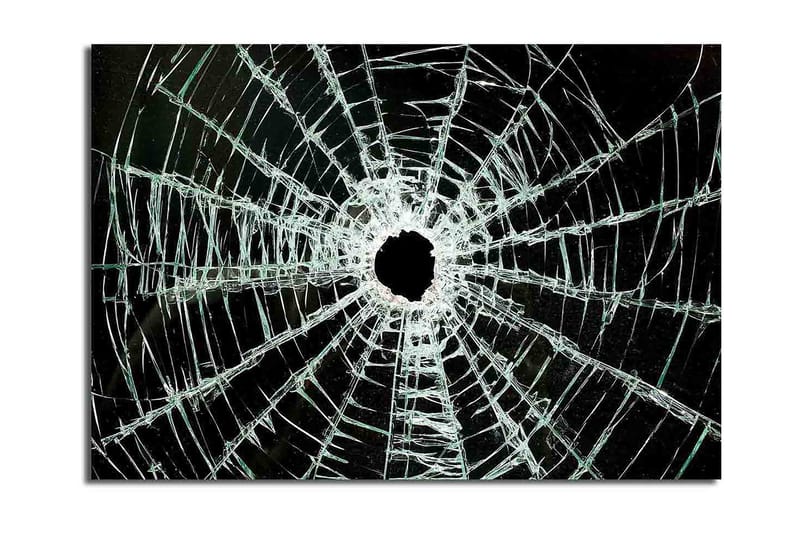 Canvas taulu 70x100 cm - Lähikuva säröilevästä lasiruudusta, jossa on keskellä reikä ja ulospäin ulottuvia halkeamia, Musta / Läpinäkyvä