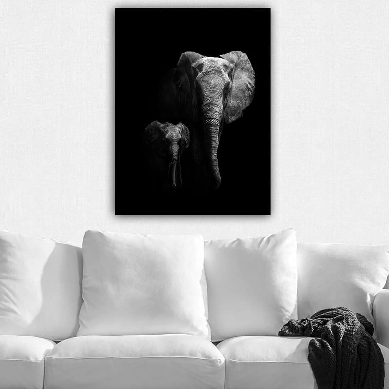 Canvas taulu 70x100 cm - Majesteettinen norsu ja vasikka korostavat heidän suhdettaan dramaattisessa mustavalkoisessa sommitelmassa - Musta / Harmaa - Sisustustuotteet - Taulu & taide - Canvas-taulu