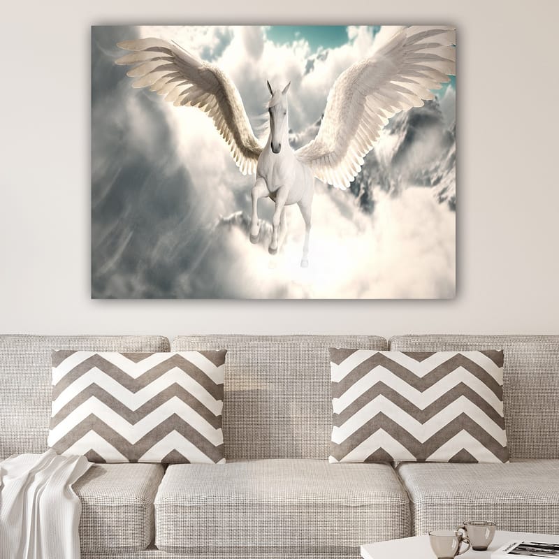 Canvas taulu 70x100 cm - Majesteettinen siivekäs yksisarvinen liitää pilvien läpi - Valkoinen / Vaaleansininen / Harmaa - Sisustustuotteet - Taulu & taide - Canvas-taulu