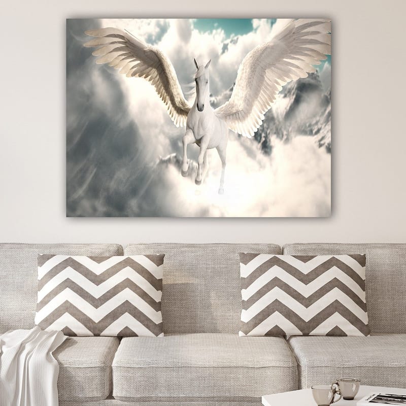 Canvas taulu 70x100 cm - Majesteettinen siivekäs yksisarvinen liitää pilvien läpi - Valkoinen / Vaaleansininen / Harmaa - Sisustustuotteet - Taulu & taide - Canvas-taulu