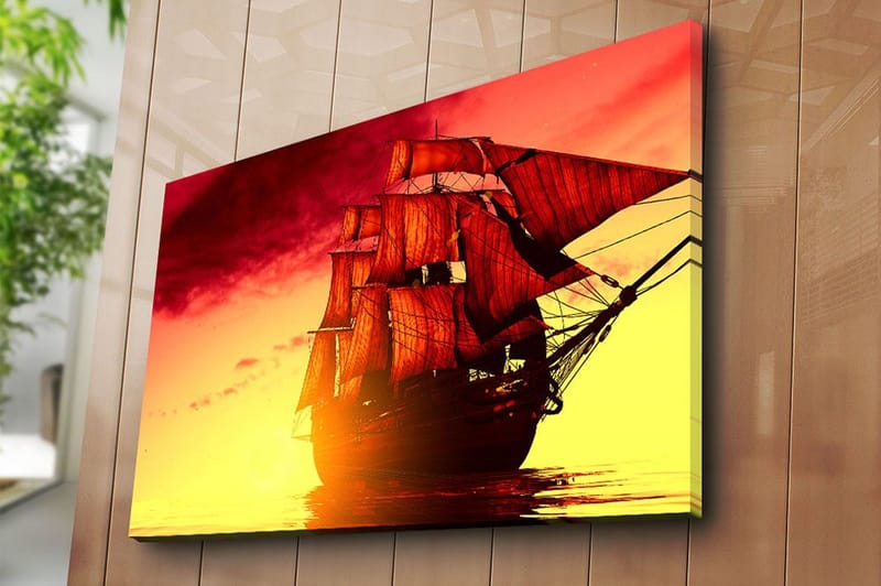 Canvas taulu 70x100 cm - Majesteettinen purjelaiva punaisine purjeineen navigoi kultaisessa auringonlaskussa - Punainen / Oranssi / Keltainen - Sisustustuotteet - Taulu & taide - Canvas-taulu