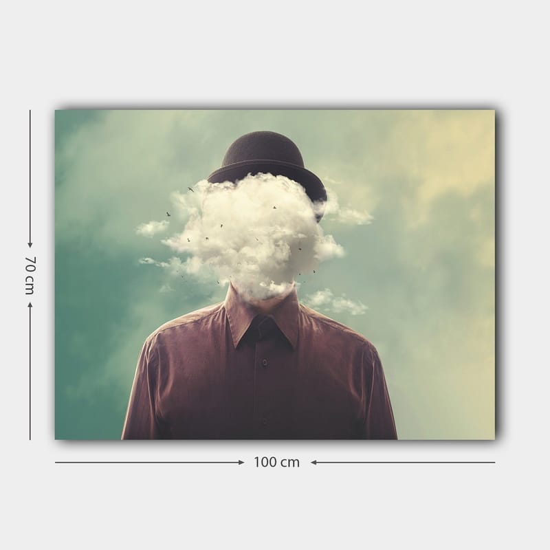 Canvas taulu 70x100 cm - Mies hatussa, jonka kasvot peittyvät pilvimuodostelmaan - Tummanruskea / Vaaleanharmaa / Vihreä - Sisustustuotteet - Taulu & taide - Canvas-taulu