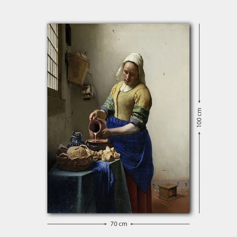 Canvas taulu 70x100 cm - Nainen kaatamassa maitoa kulhoon kirkkaassa keittiössä - Sininen / Keltainen / Ruskea - Sisustustuotteet - Taulu & taide - Canvas-taulu