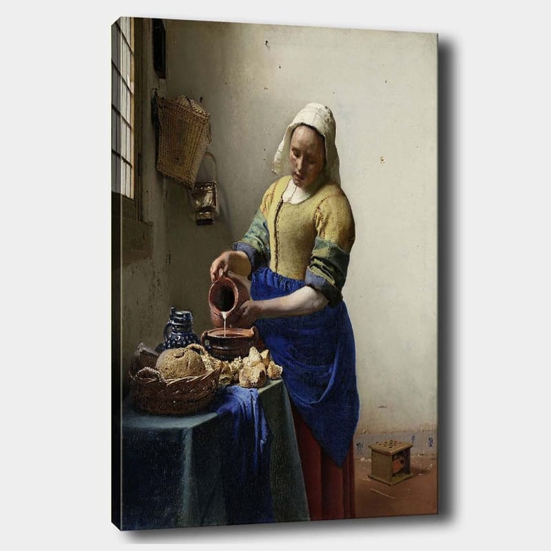 Canvas taulu 70x100 cm - Nainen kaatamassa maitoa kulhoon kirkkaassa keittiössä, Sininen / Keltainen / Ruskea