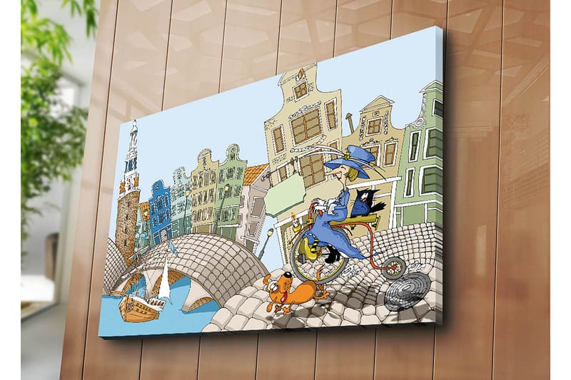 Canvas taulu 70x100 cm - Nainen polkupyörällä koiran ja kissan kanssa, värikkäiden talojen ja sillan ympäröimänä - Sininen / Vihreä / Oranssi - Sisustustuotteet - Taulu & taide - Canvas-taulu