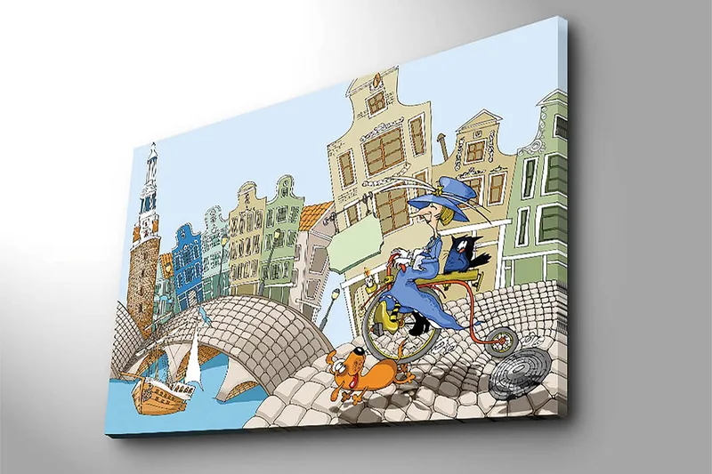 Canvas taulu 70x100 cm - Nainen polkupyörällä koiran ja kissan kanssa, värikkäiden talojen ja sillan ympäröimänä - Sininen / Vihreä / Oranssi - Sisustustuotteet - Taulu & taide - Canvas-taulu