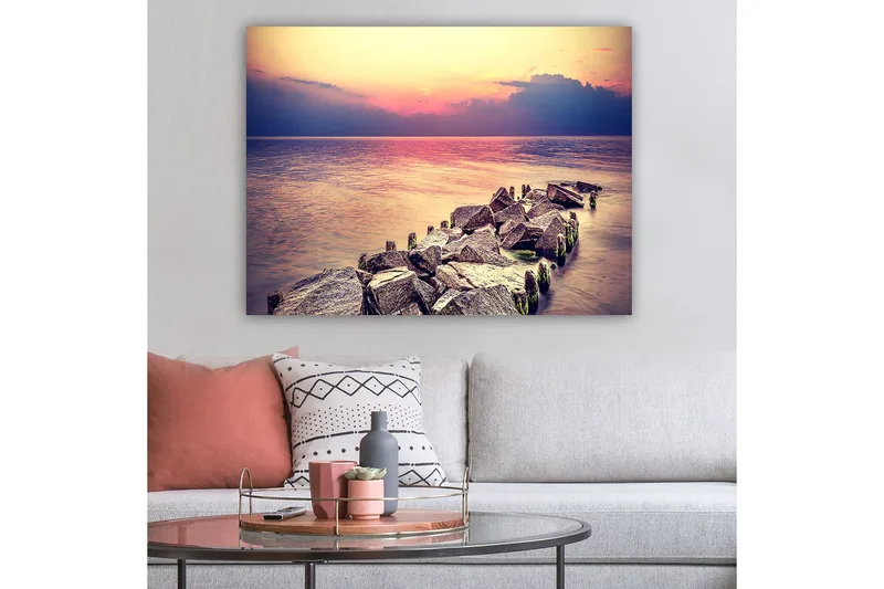 Canvas taulu 70x100 cm - Rauhallinen näkymä kallioiselle rannalle auringonlaskun aikaan - Harmaa / Vaaleansininen / Vaaleanpunainen - Sisustustuotteet - Taulu & taide - Canvas-taulu