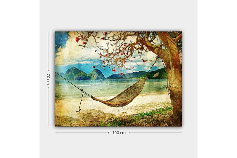 Canvas taulu 70x100 cm - Rentouttava riippumatto puiden oksien välissä kauniilla rannalla, taustalla kaukaiset vuoret - Vihreä / Ruskea / Sininen - Sisustustuotteet - Taulu & taide - Canvas-taulu