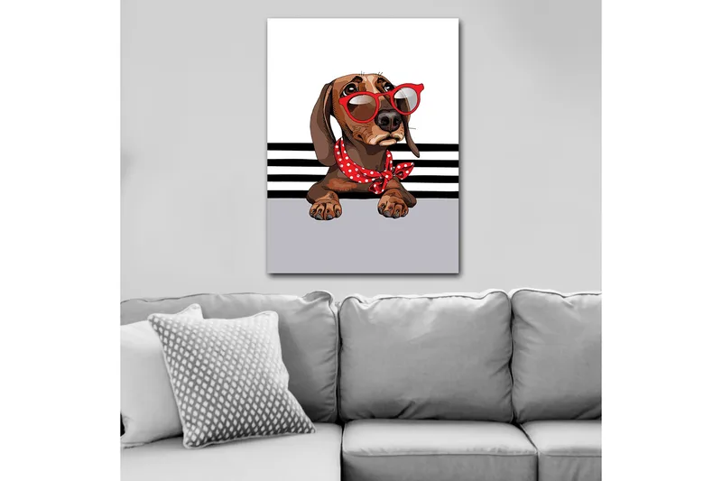 Canvas taulu 70x100 cm - Söpö koira aurinkolaseissa ja punaisessa pilkullisessa huivissa, Ruskea / Punainen / Harmaa