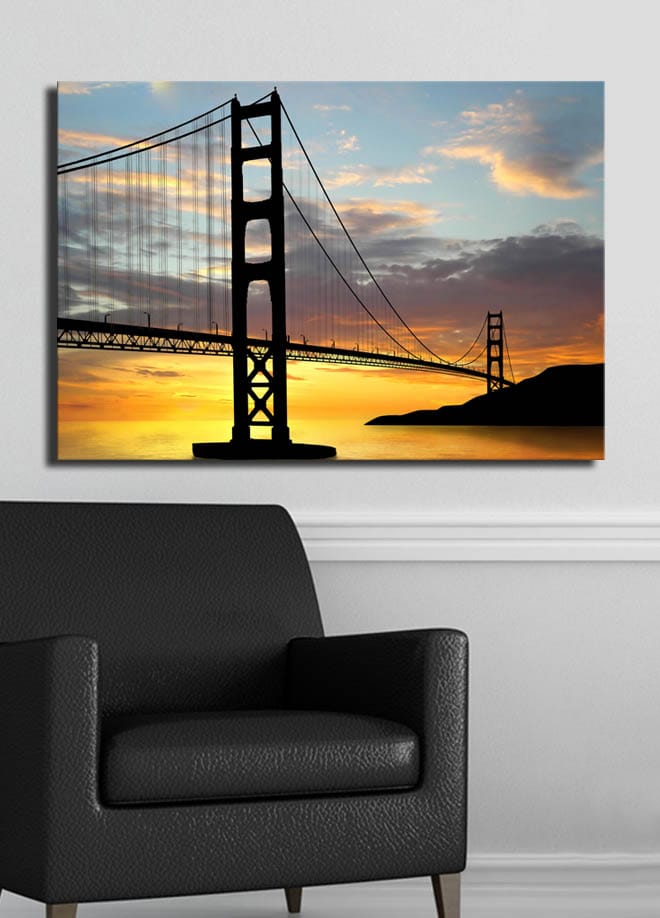 Canvas taulu 70x100 cm - Sillan siluetti värikästä auringonlaskua vasten - Oranssi / Musta / Sininen - Sisustustuotteet - Taulu & taide - Canvas-taulu