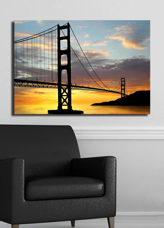 Canvas taulu 70x100 cm - Sillan siluetti värikästä auringonlaskua vasten - Oranssi / Musta / Sininen - Sisustustuotteet - Taulu & taide - Canvas-taulu