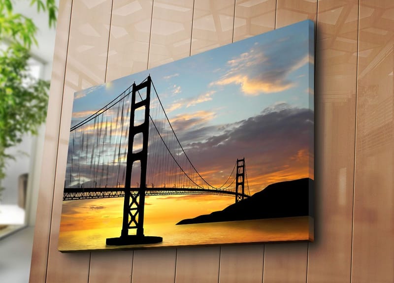 Canvas taulu 70x100 cm - Sillan siluetti värikästä auringonlaskua vasten - Oranssi / Musta / Sininen - Sisustustuotteet - Taulu & taide - Canvas-taulu