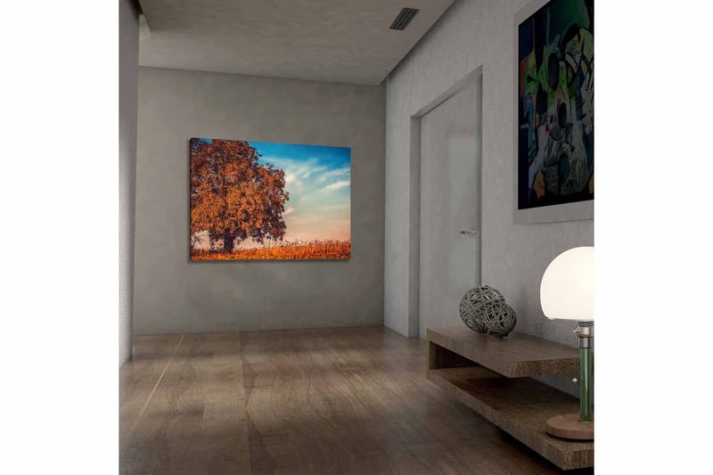 Canvas taulu 70x100 cm - Suuri, oranssi puun latvus syksyn väreissä kirkasta sinistä taivasta vasten, Oranssi / Sininen / Beige