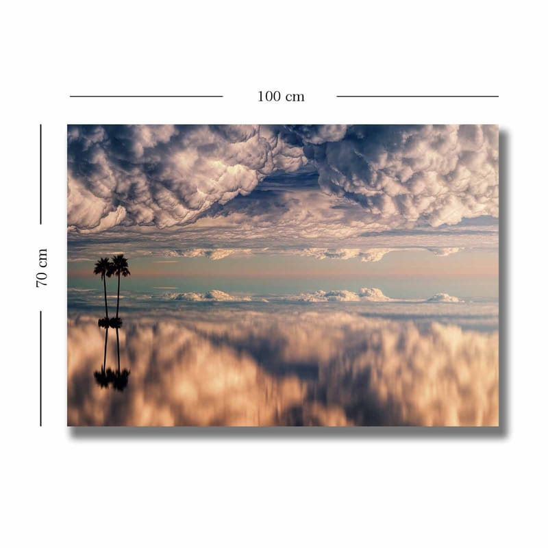 Canvas taulu 70x100 cm - Tunnelmallinen maisemamaalaus, jossa palmut heijastuvat unenomaiseen, pilvien täyttämään taivaaseen. - Sininen / Beige / Valkoinen - Sisustustuotteet - Taulu & taide - Canvas-taulu