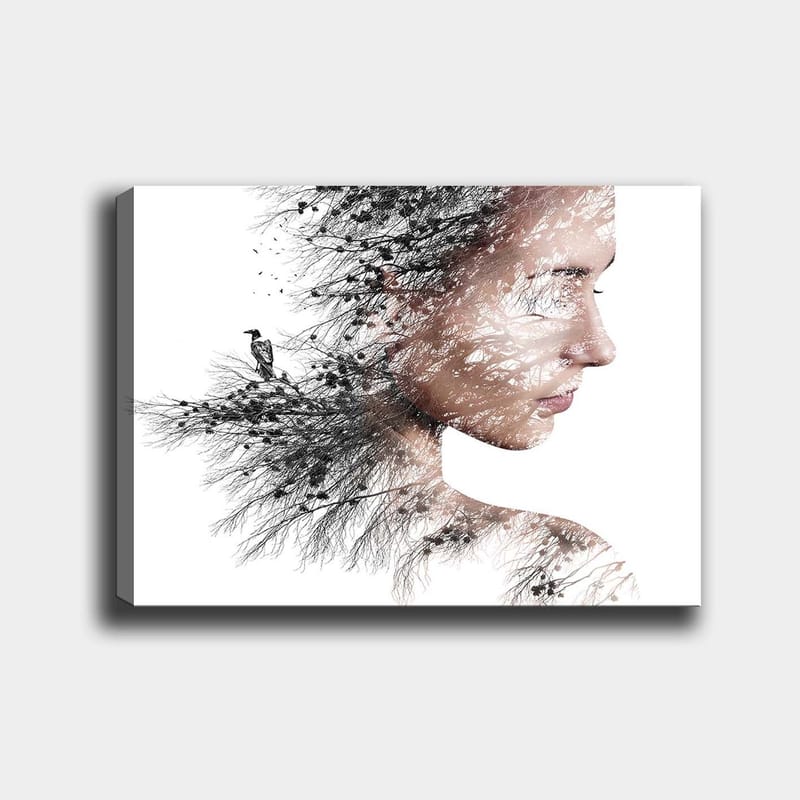 Canvas taulu 70x100 cm - Tyylitelty muotokuva naisesta, jonka siluetissa on puita ja lintuja, Musta / Harmaa / Ruskea