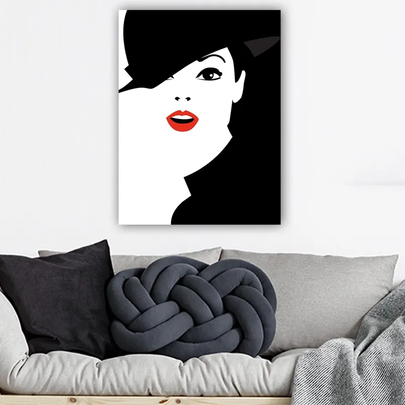 Canvas taulu 70x100 cm - Tyylitelty nainen mustalla hatulla ja punaisilla huulilla, Musta / Valkoinen / Punainen