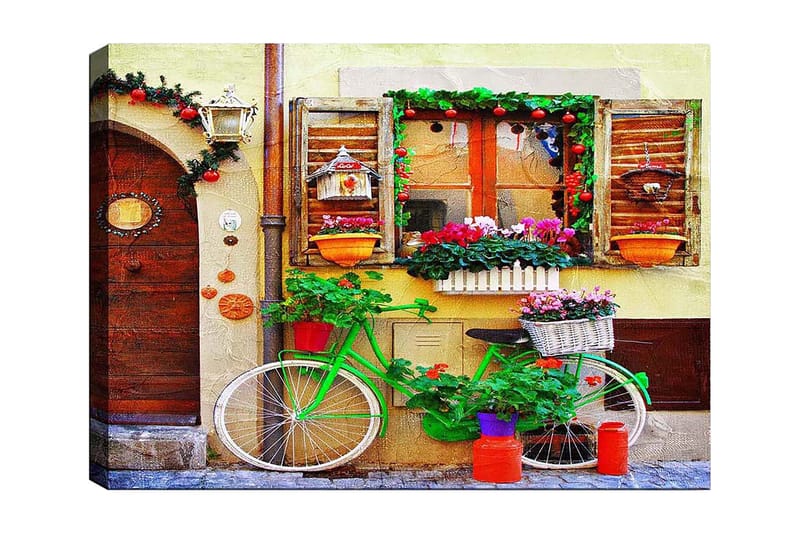 Canvas taulu 70x100 cm - Värikäs, kukilla ja ruukuilla koristeltu polkupyörä viehättävän ikkunoilla ja koristeilla varustetun seinän edessä, Vihreä / Vaaleanpunainen / Oranssi