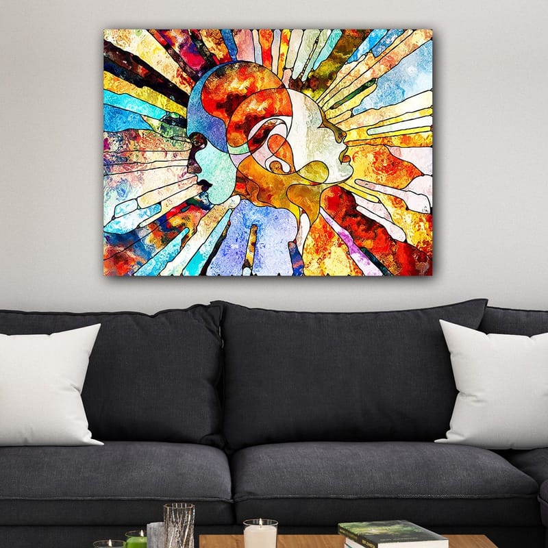 Canvas taulu 70x100 cm - Värikäs abstrakti kuva kahdesta kasvosta, jotka symboloivat yhdessäoloa ja kommunikaatiota, Punainen / Sininen / Oranssi