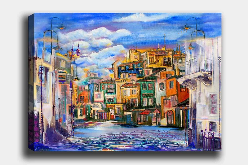 Canvas taulu 70x100 cm - Värikäs kaupunkikuva eri sävyisillä taloilla ja kirkkaalla taivaalla, Sininen / Vihreä / Oranssi