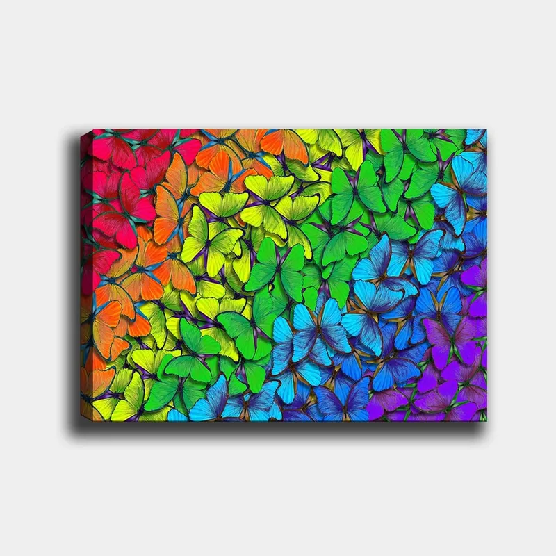 Canvas taulu 70x100 cm - Värikäs kokoelma perhosia eri sävyissä, jotka luovat eloisan ja harmonisen sommitelman, Vihreä / Sininen / Oranssi