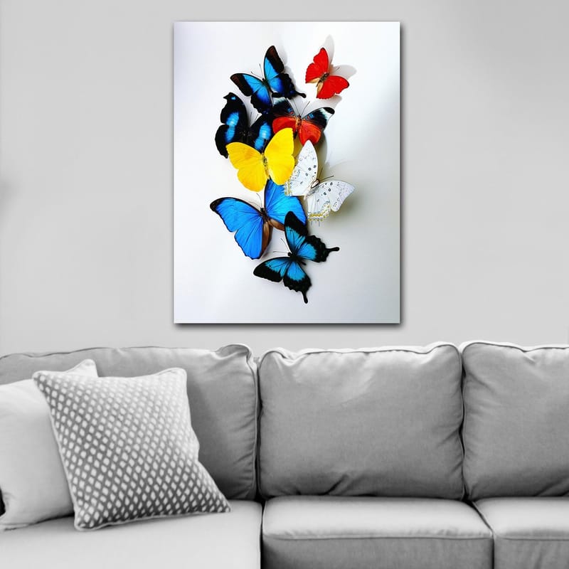 Canvas taulu 70x100 cm - Värikäs kokoelma perhosia eri sävyissä, jotka luovat eloisan ja dynaamisen sommitelman - Sininen / Keltainen / Punainen - Sisustustuotteet - Taulu & taide - Canvas-taulu