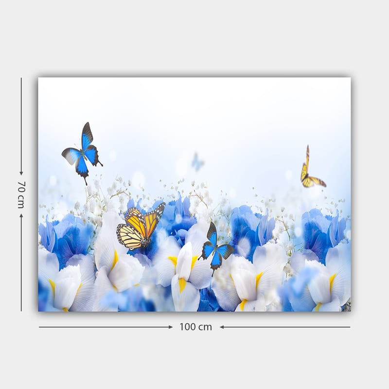 Canvas taulu 70x100 cm - Värikäs sommitelma perhosista, jotka leijuvat valkoisten ja sinisten kukkien yllä - Sininen / Valkoinen / Keltainen - Sisustustuotteet - Taulu & taide - Canvas-taulu